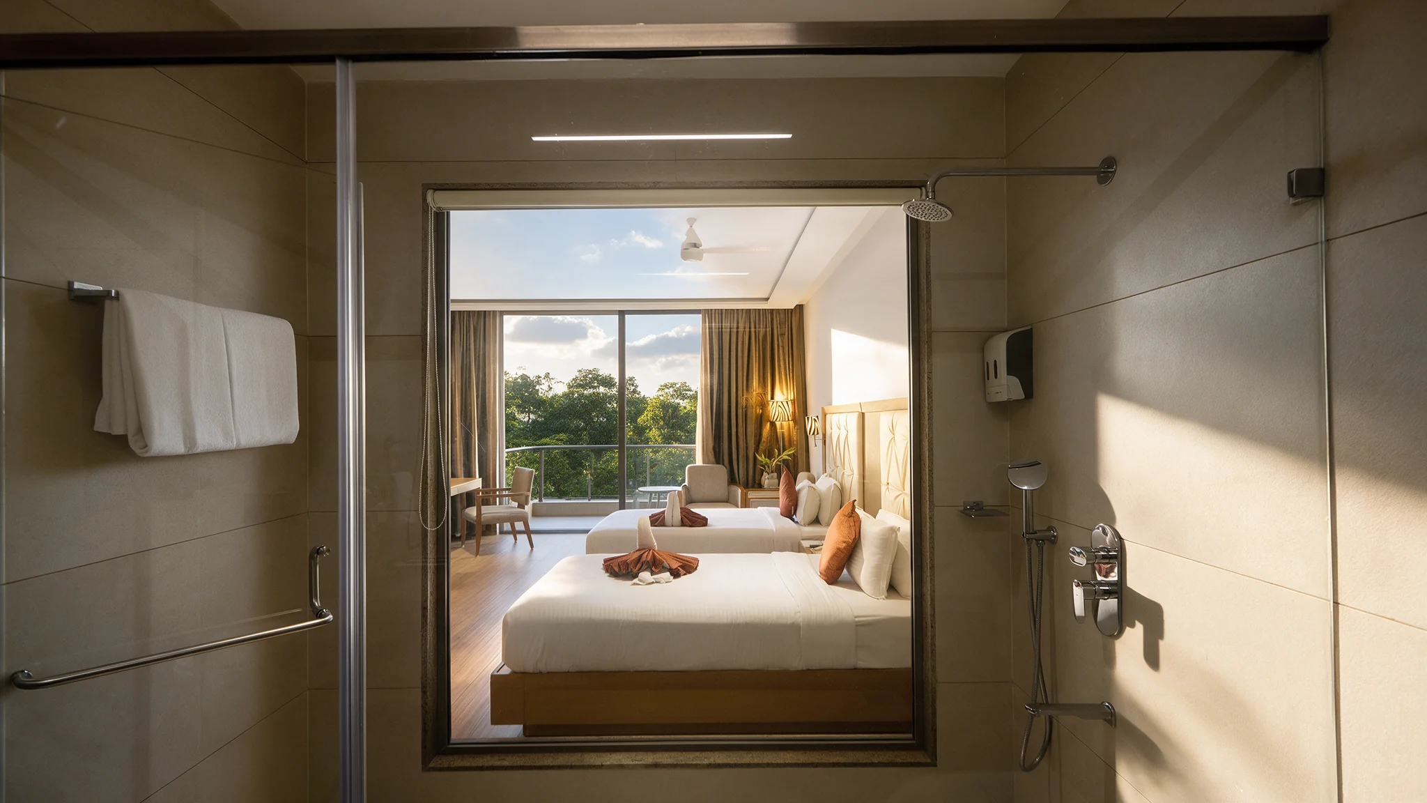 A view through the suite towards the bedroom and greenery